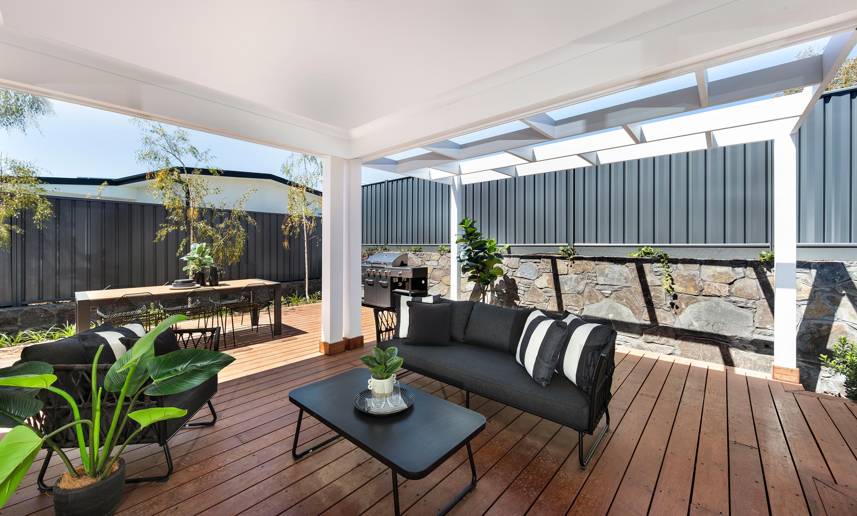 Alfresco styling with an all year round approach where shade is created and cleaning is minimalised.